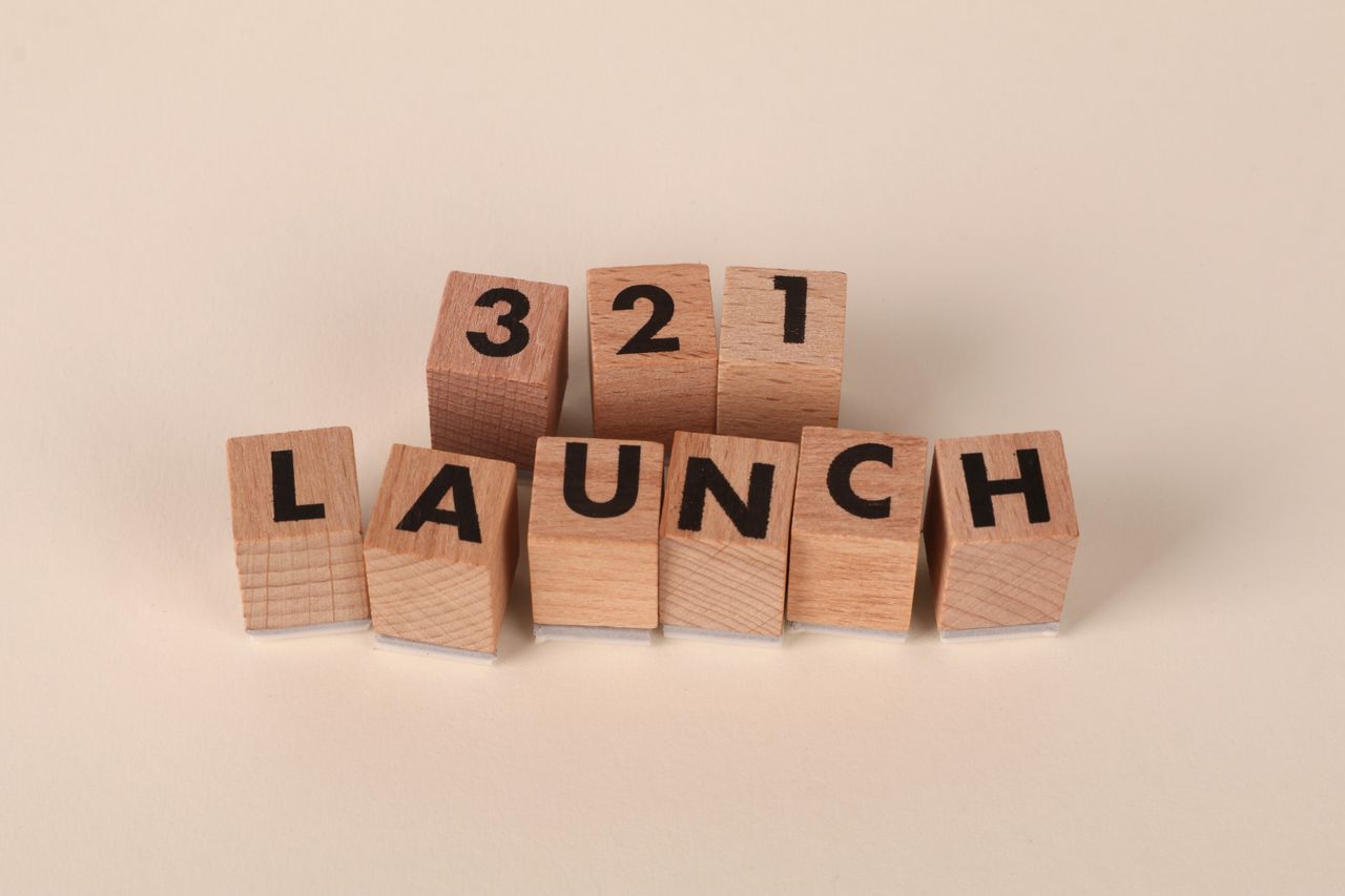 Wooden blocks arranged to spell 3, 2, 1 Launch symbolizing a countdown.